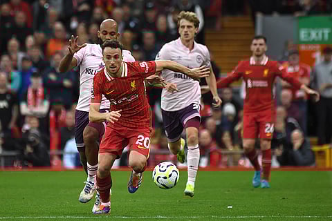 Premier League 2024-25: Liverpool's Diogo Jota, centre, in action against Brentford
